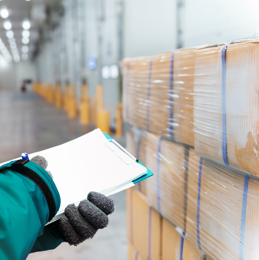 Bloored Background Of Forklift Loader In Storage Warehouse Ship